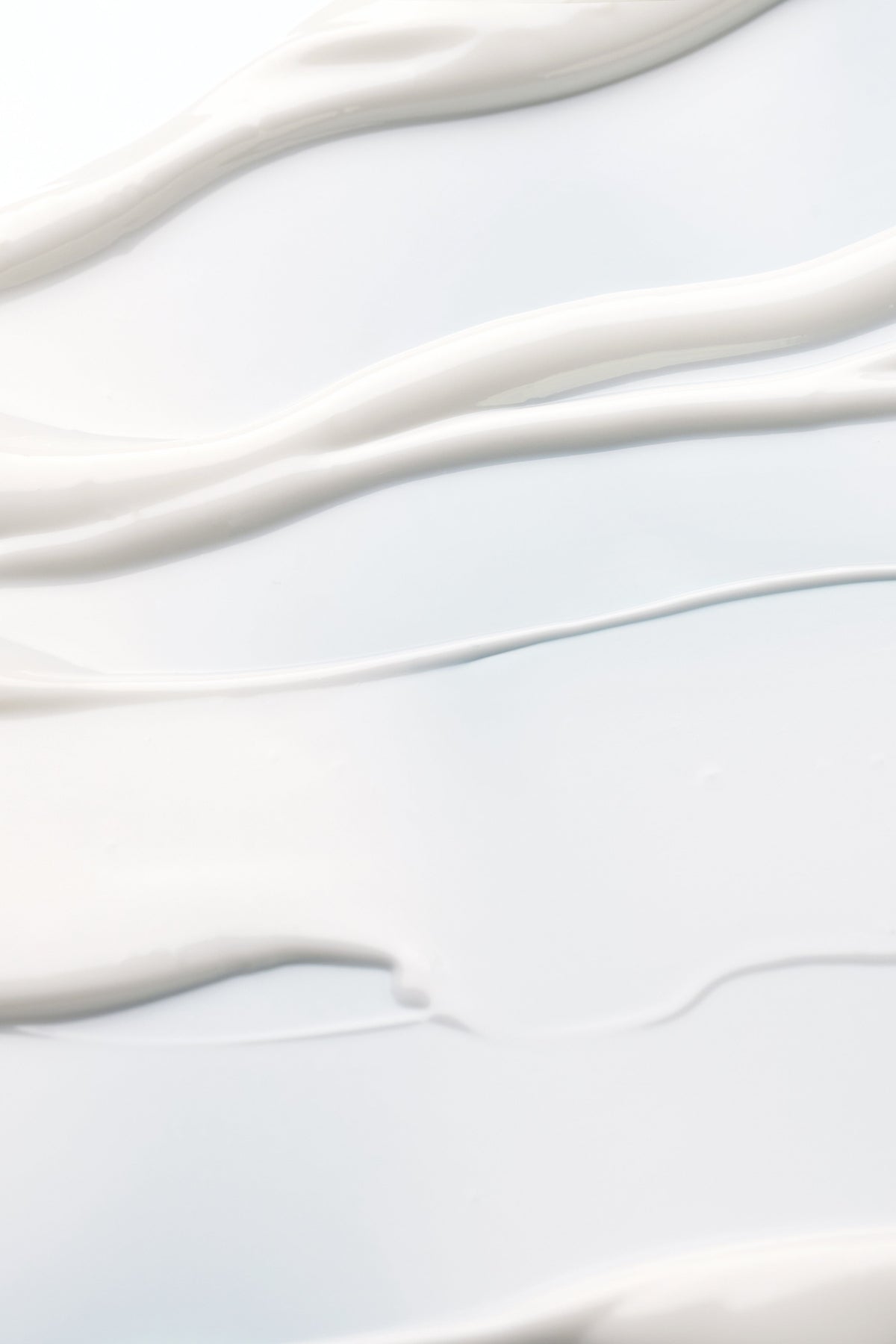 white liquid in a white surface