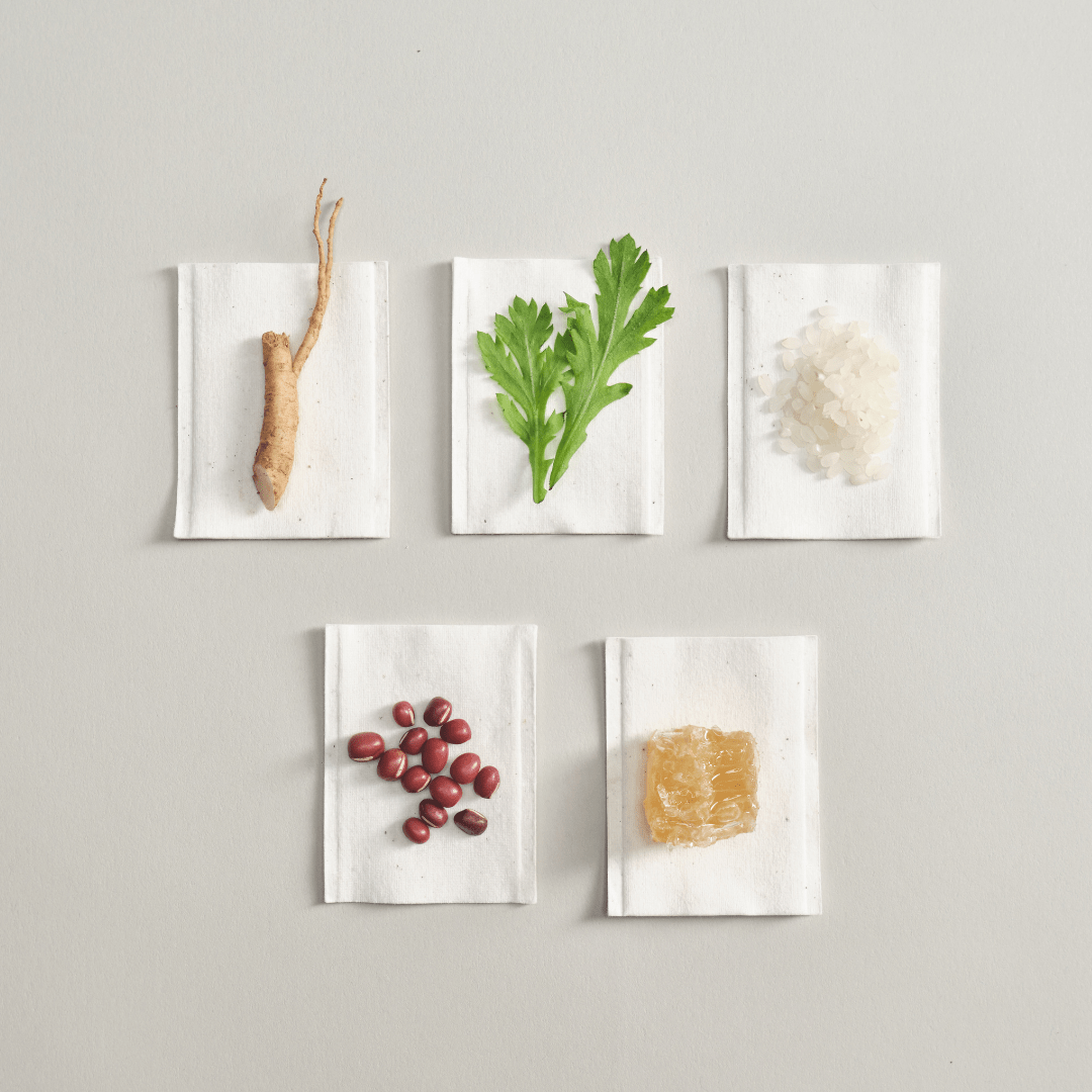 a group of white napkins with different types of food