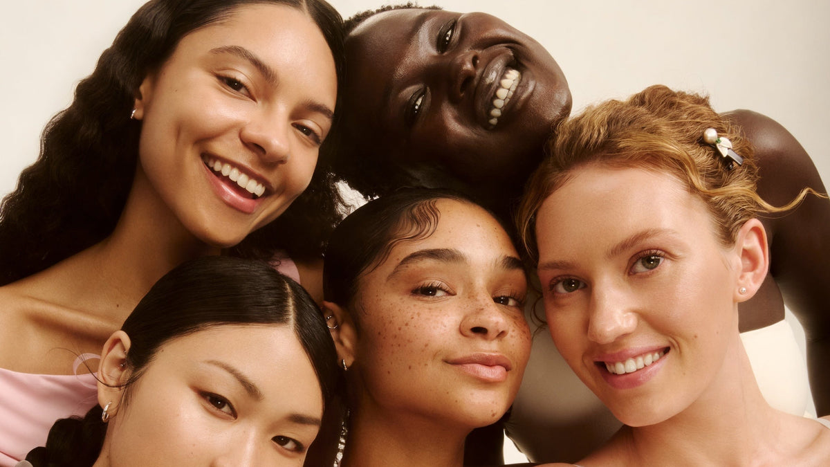 a group of women smiling