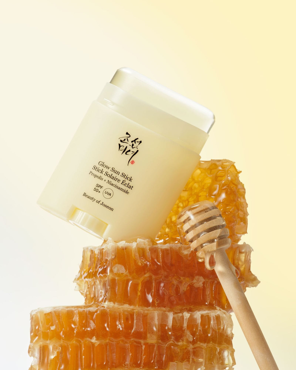 a honeycombs and a jar of cream
