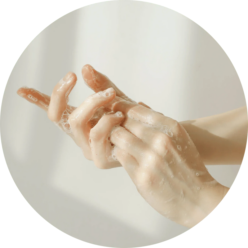 a person washing their hands