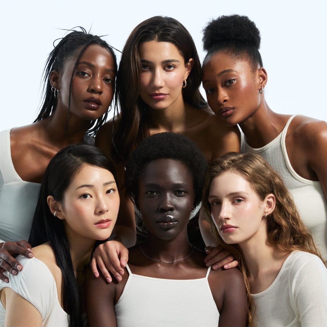 a group of women posing for a photo