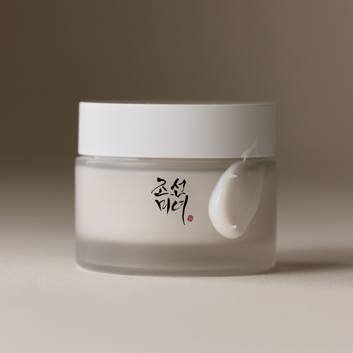 a white container with a white lid
