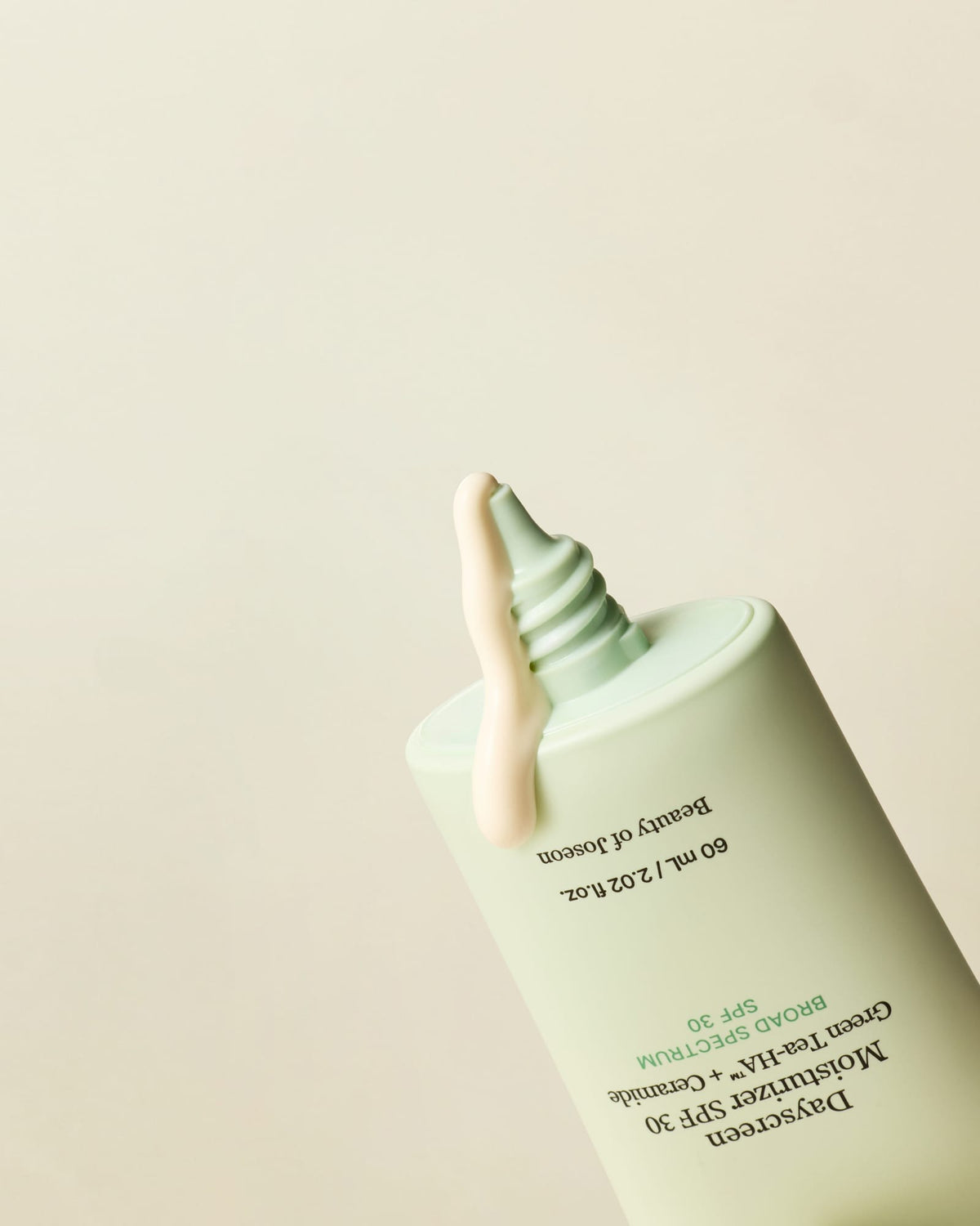 a cream dripping from a tube