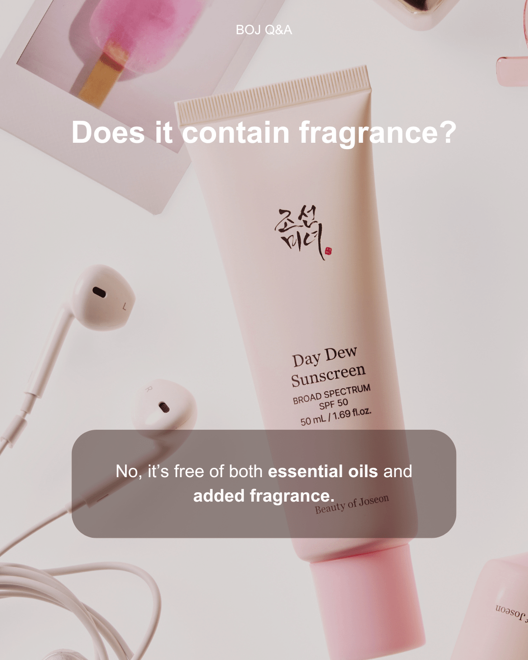 a tube of cream and earphones
