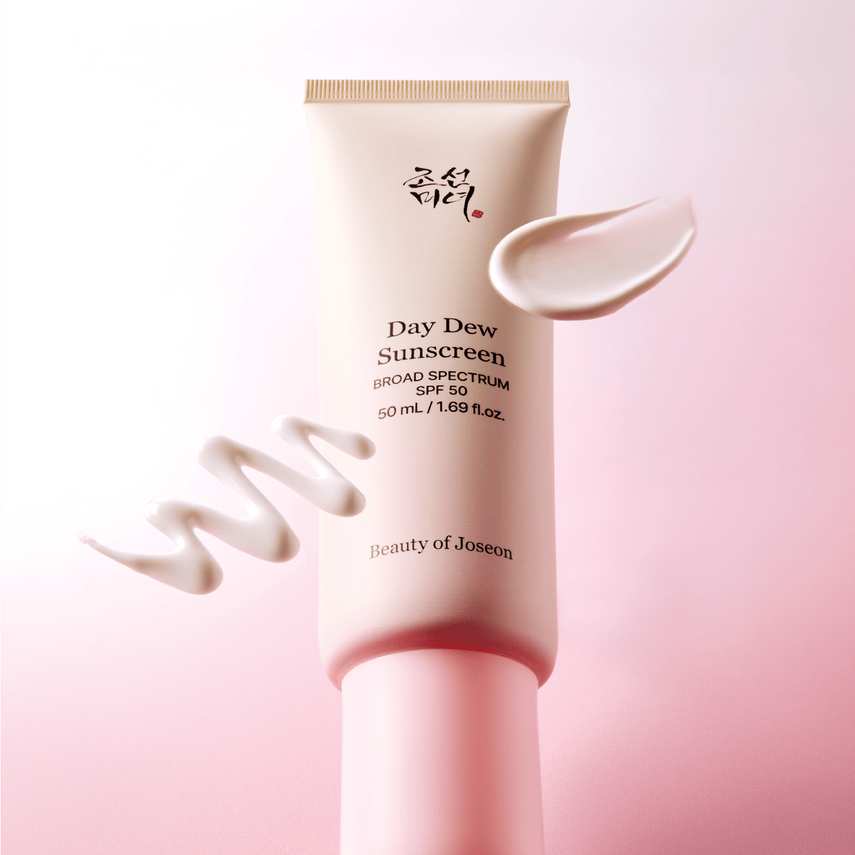 a pink tube with white liquid on it