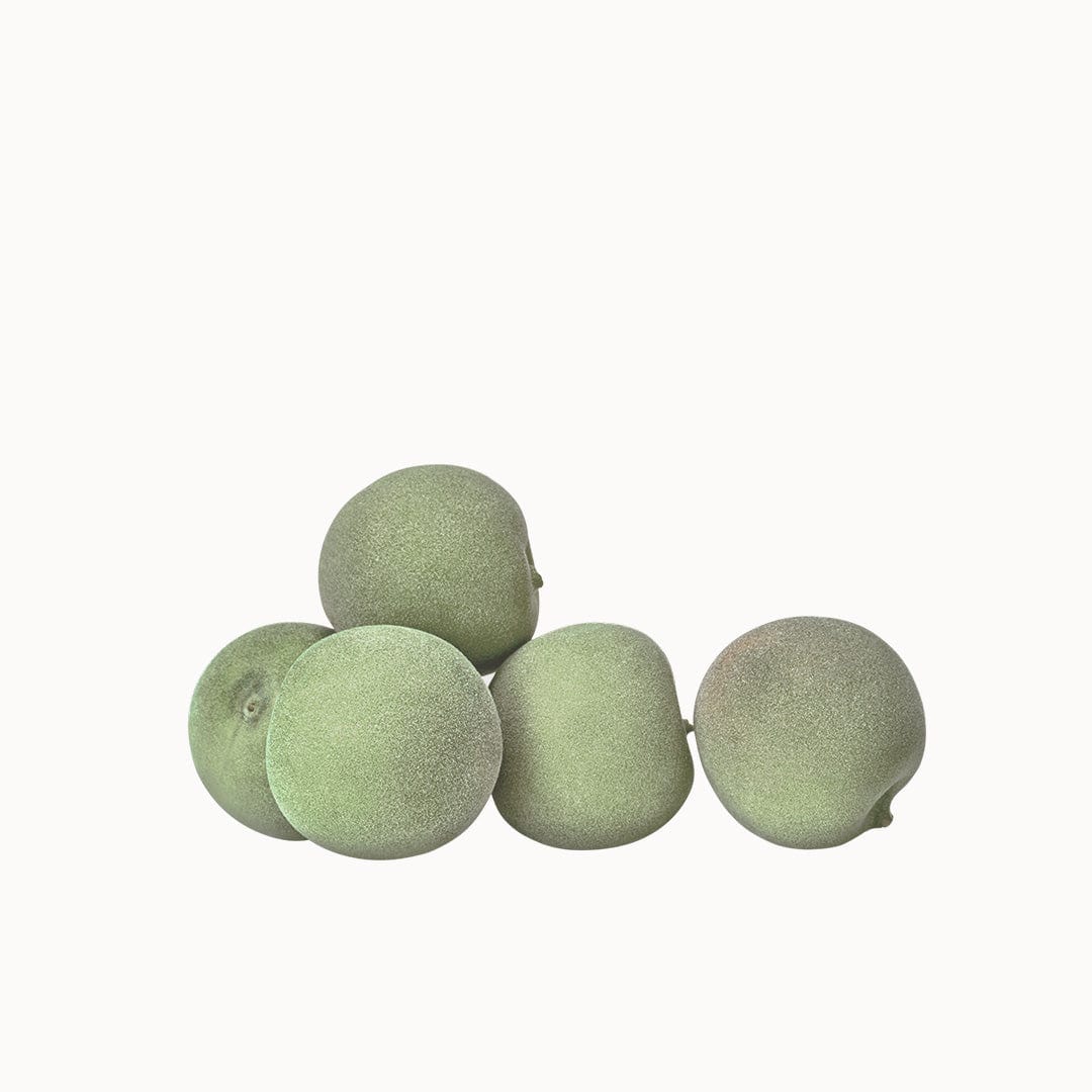 a group of green fruit