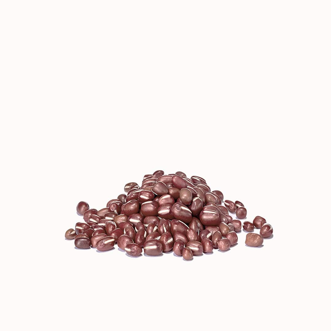 a pile of shiny red pebbles