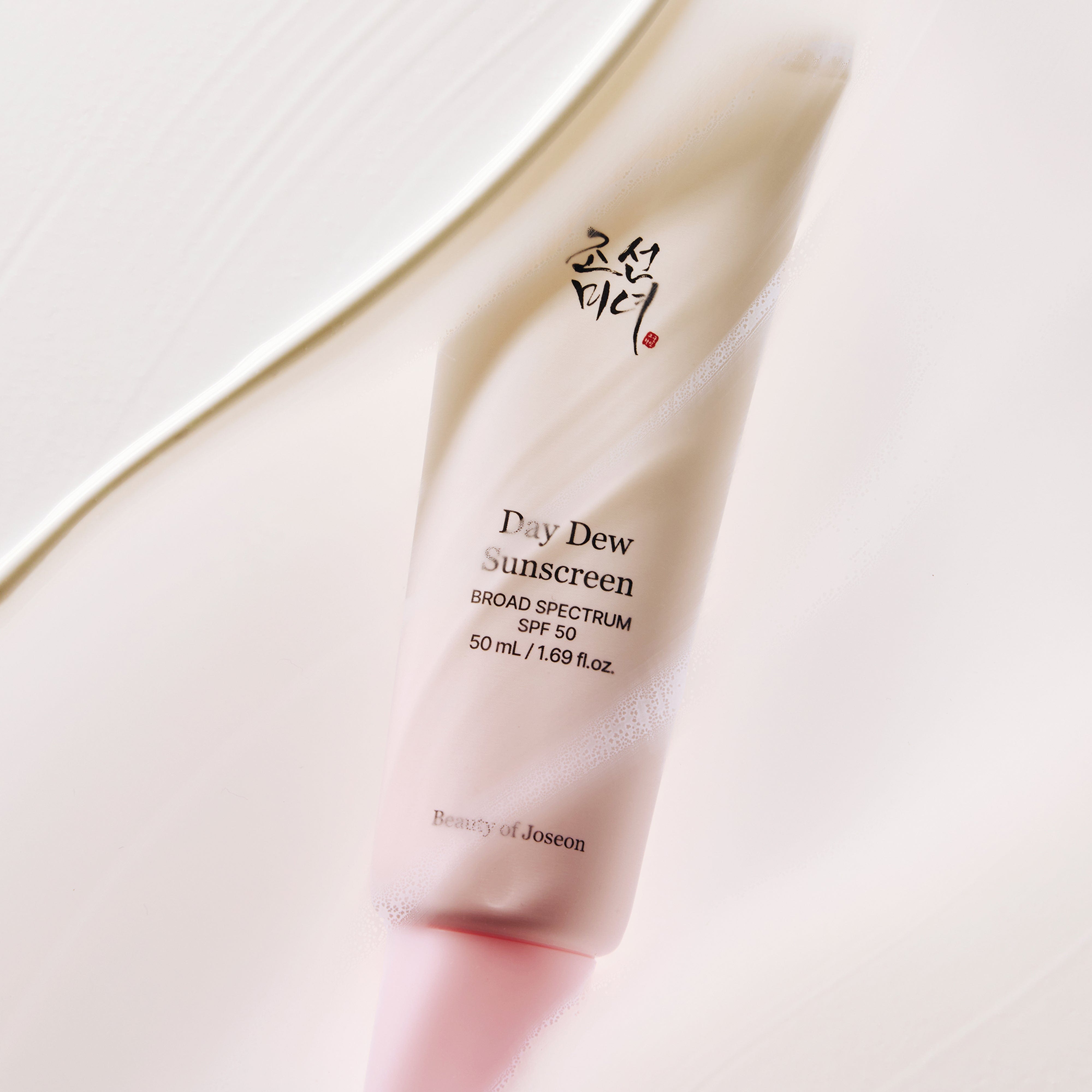 a white tube of sunscreen