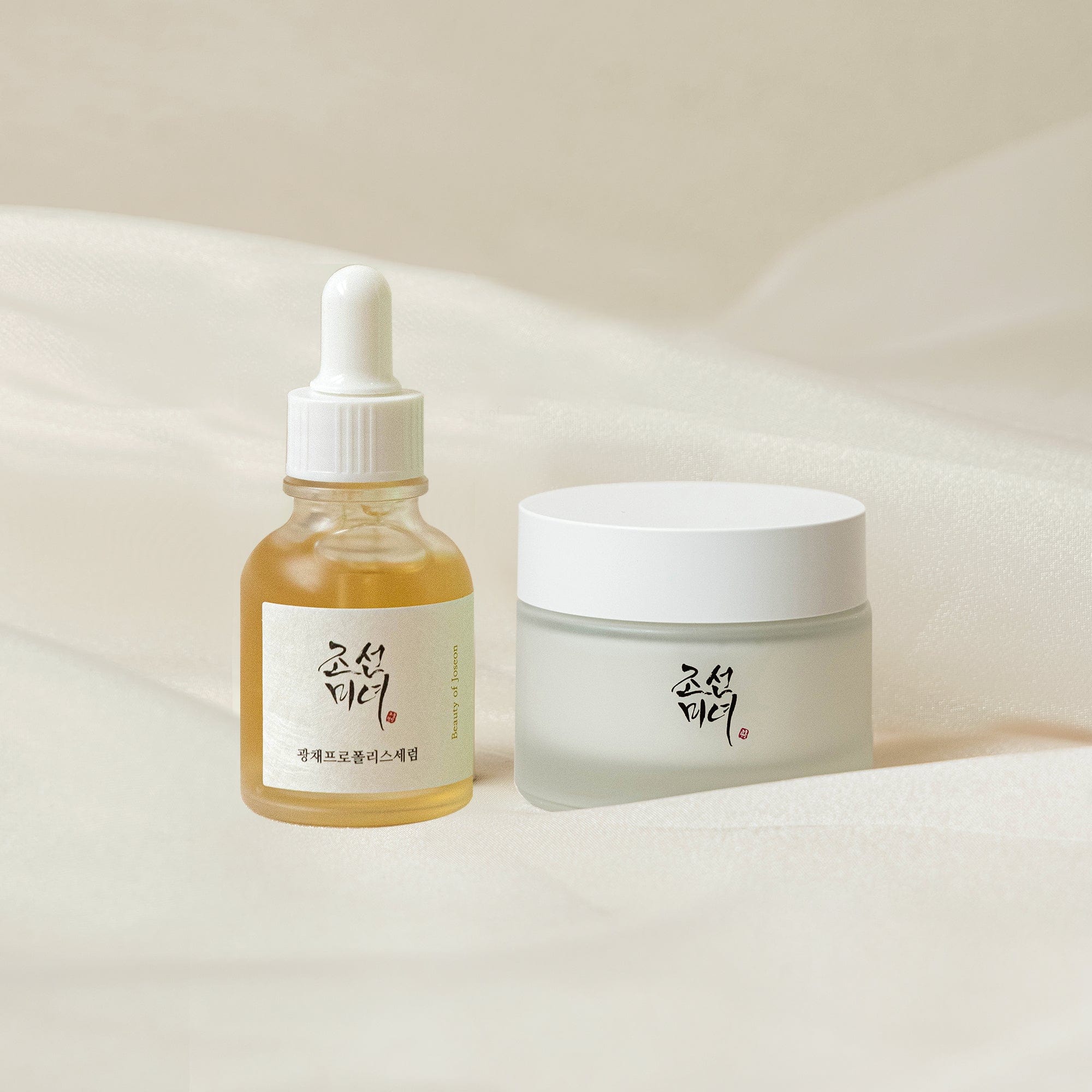 a bottle and container of cream