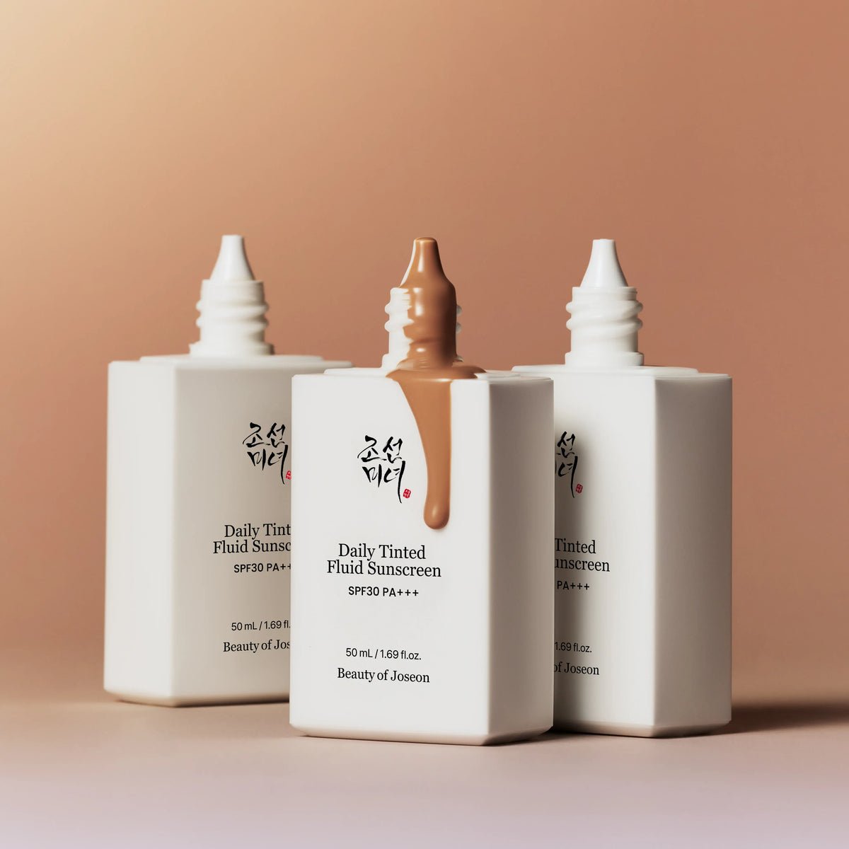 a group of white containers with brown liquid dripping from them