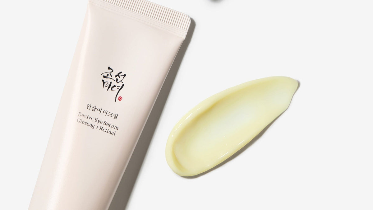 a tube of cream next to a drop of cream