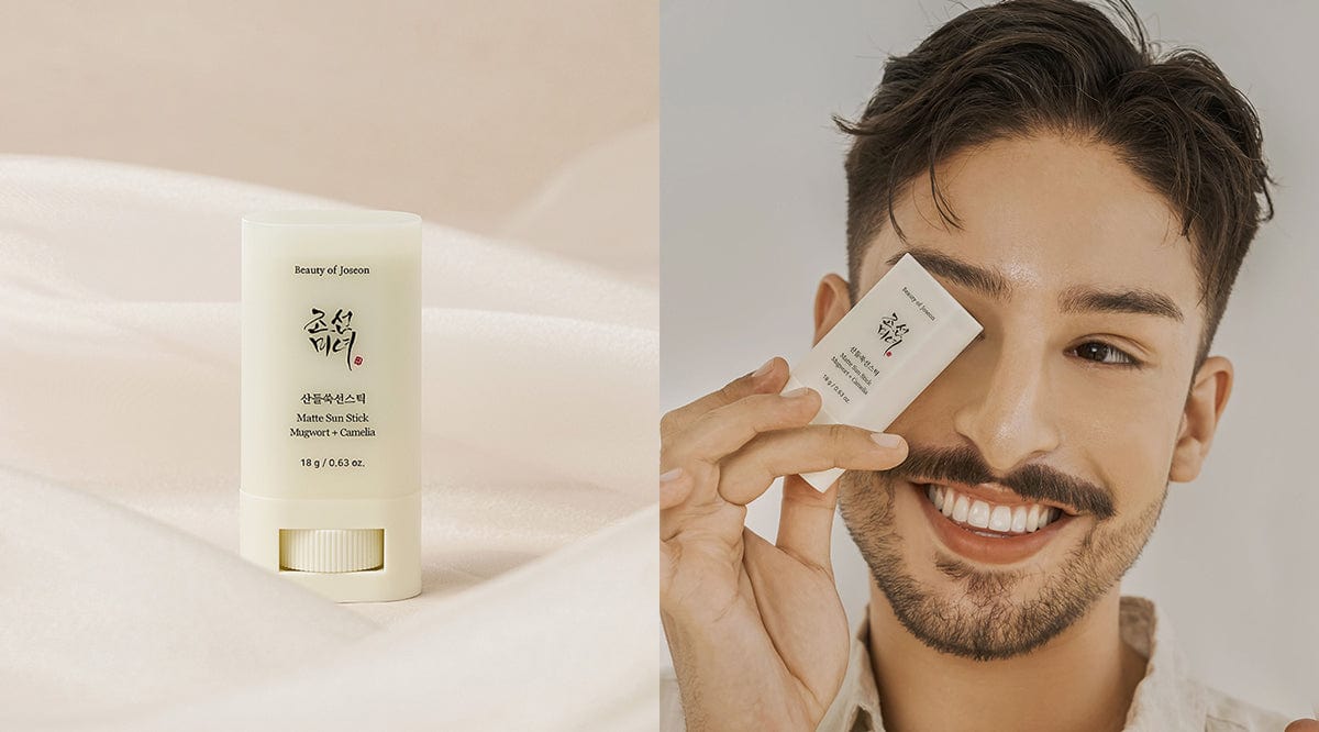 a man holding a white container with a white label on his face