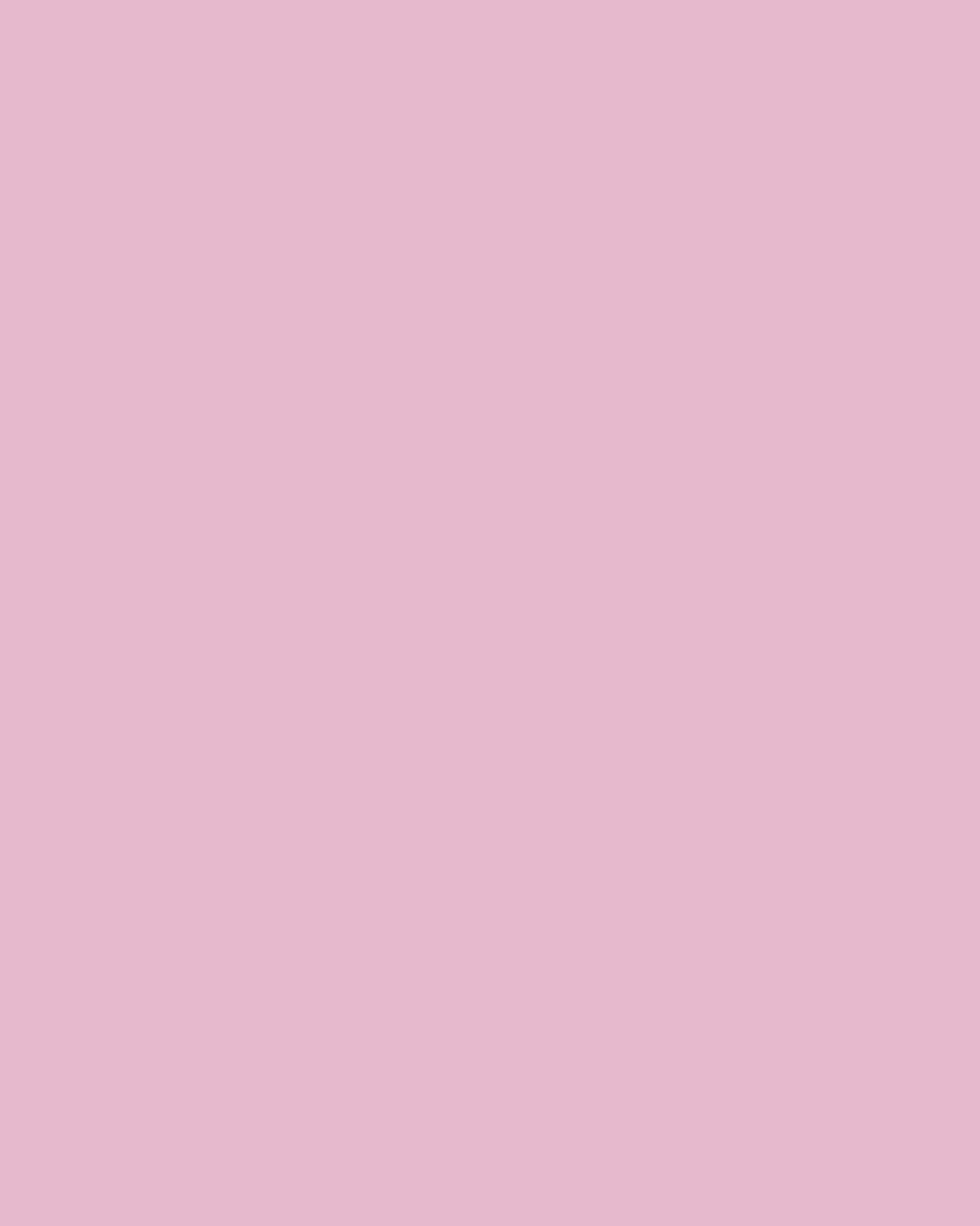 a pink square with white dots