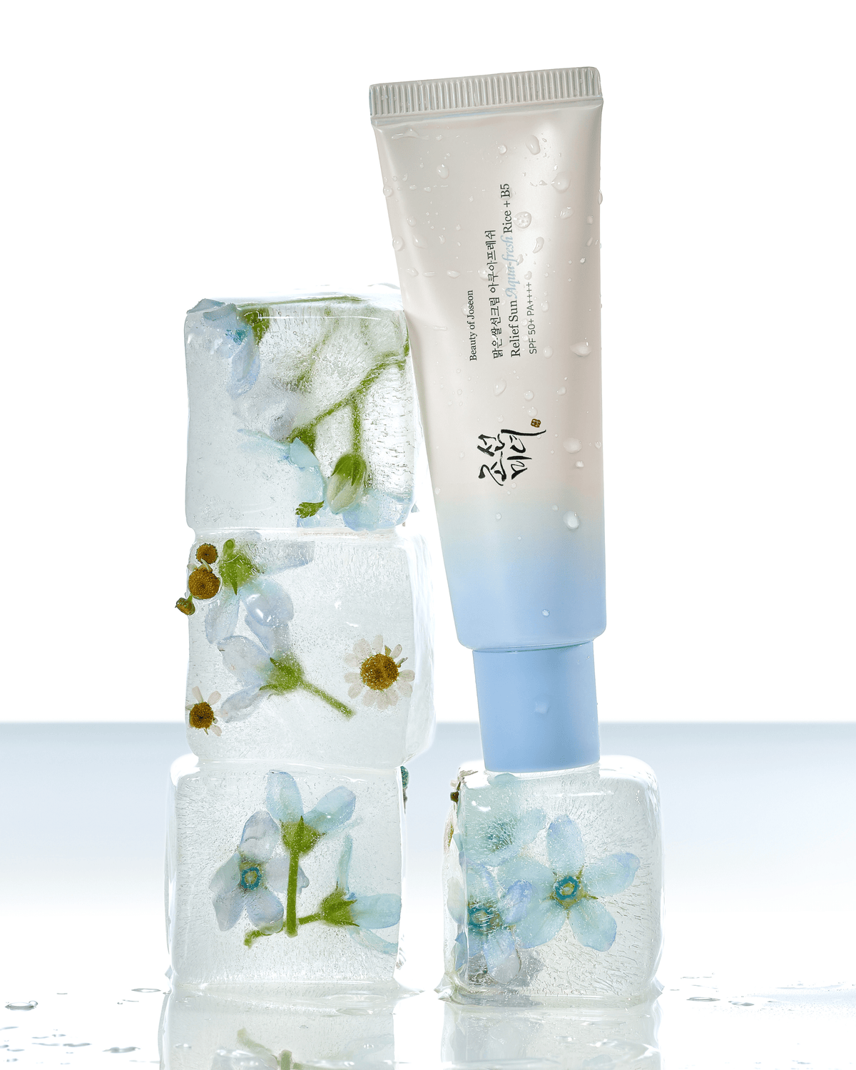 a tube of cream and ice cubes