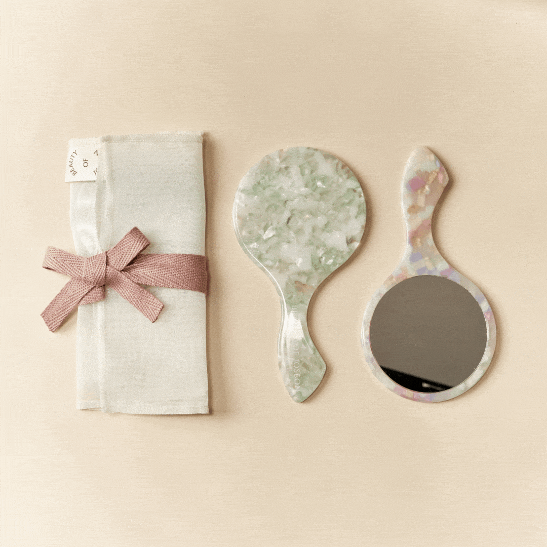 a small mirror and a small hand mirror
