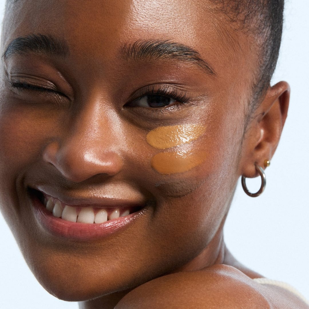 a close-up of a woman smiling
