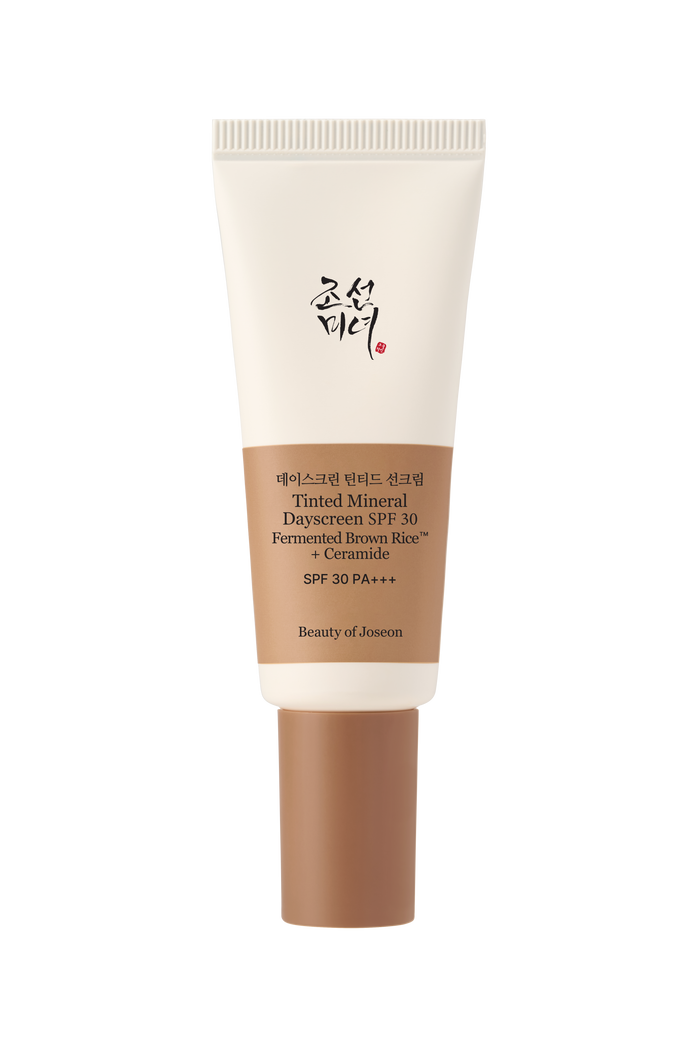 a white and brown tube with black text