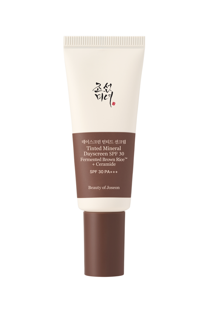 a white and brown tube of sunscreen