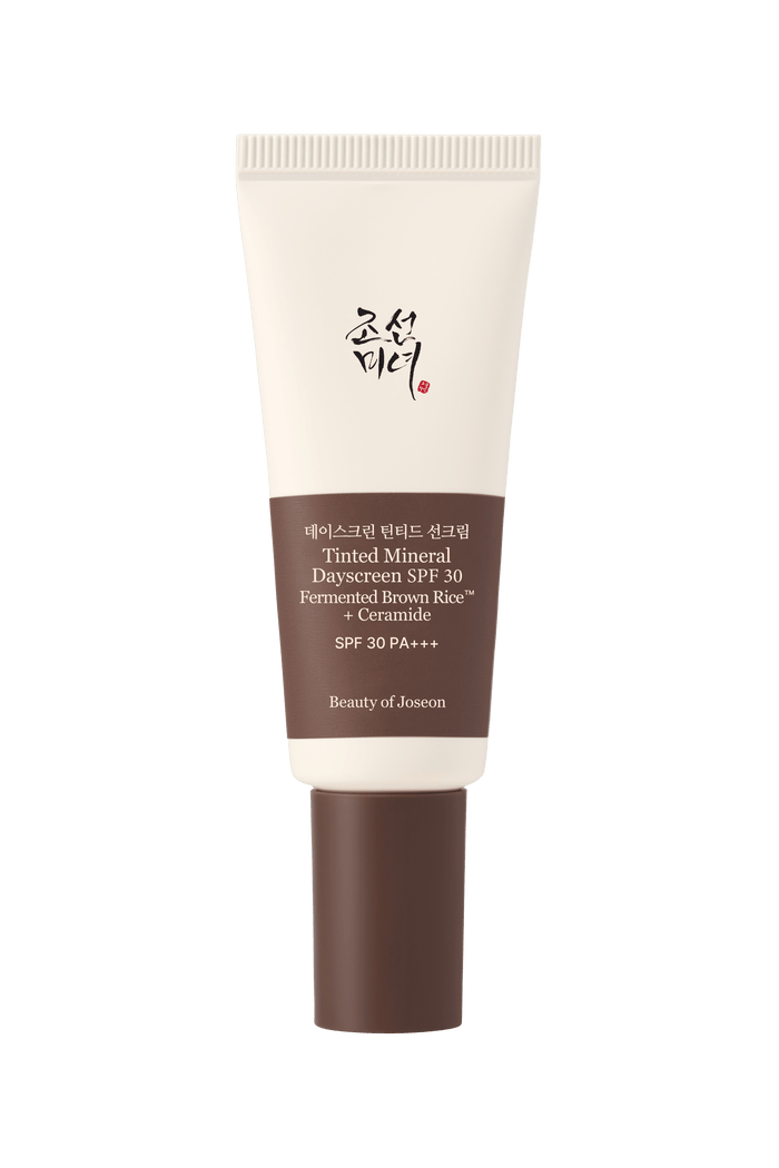 a white and brown tube with black text