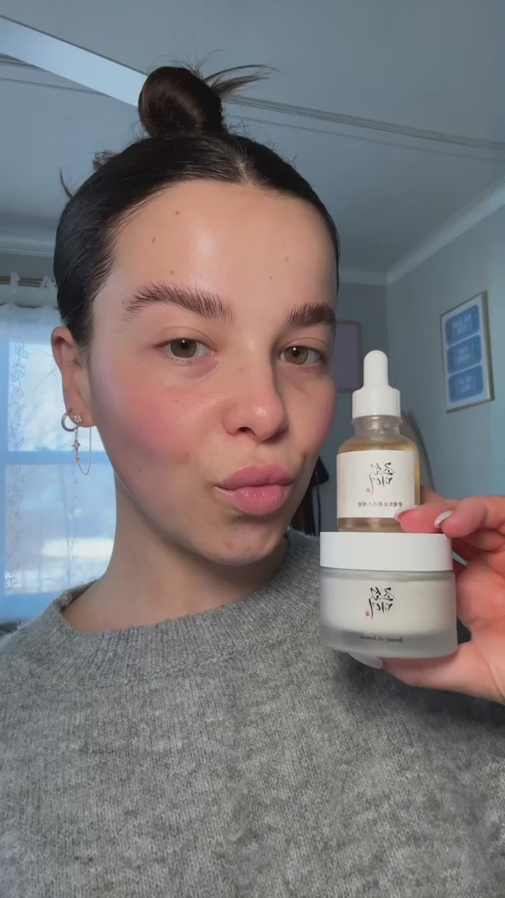 Women with cream and Serum