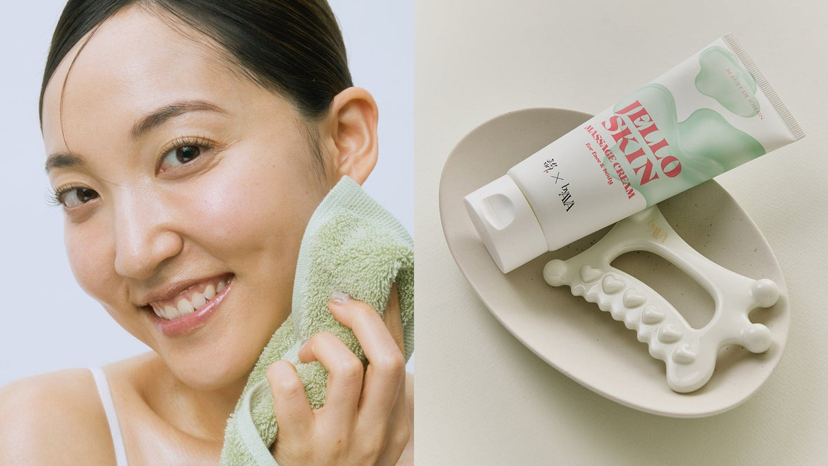 a woman holding a towel and a face wash