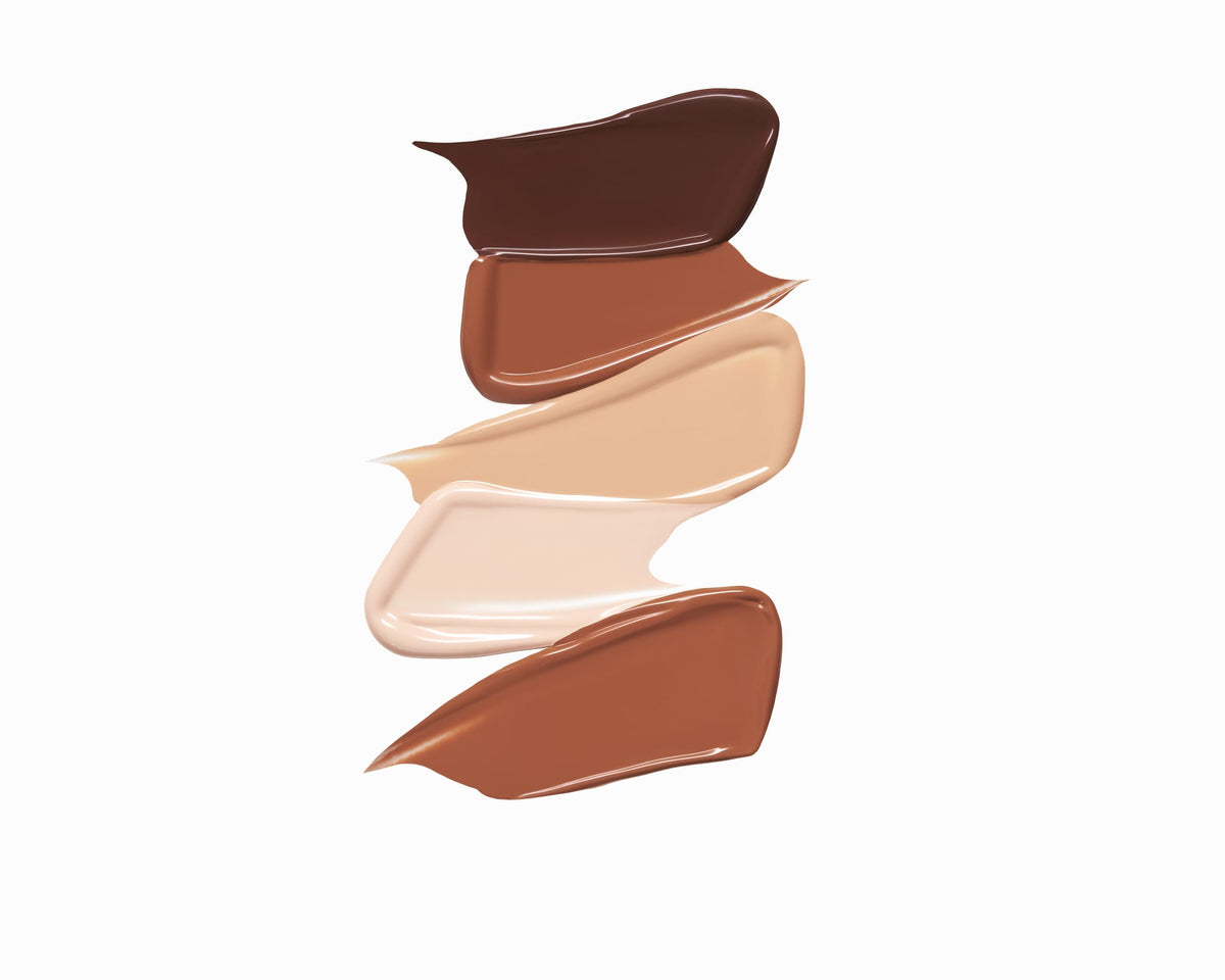 Four swatches of different brown and beige makeup shades on a white background